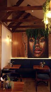 Oscar's dining room with portrait artwork